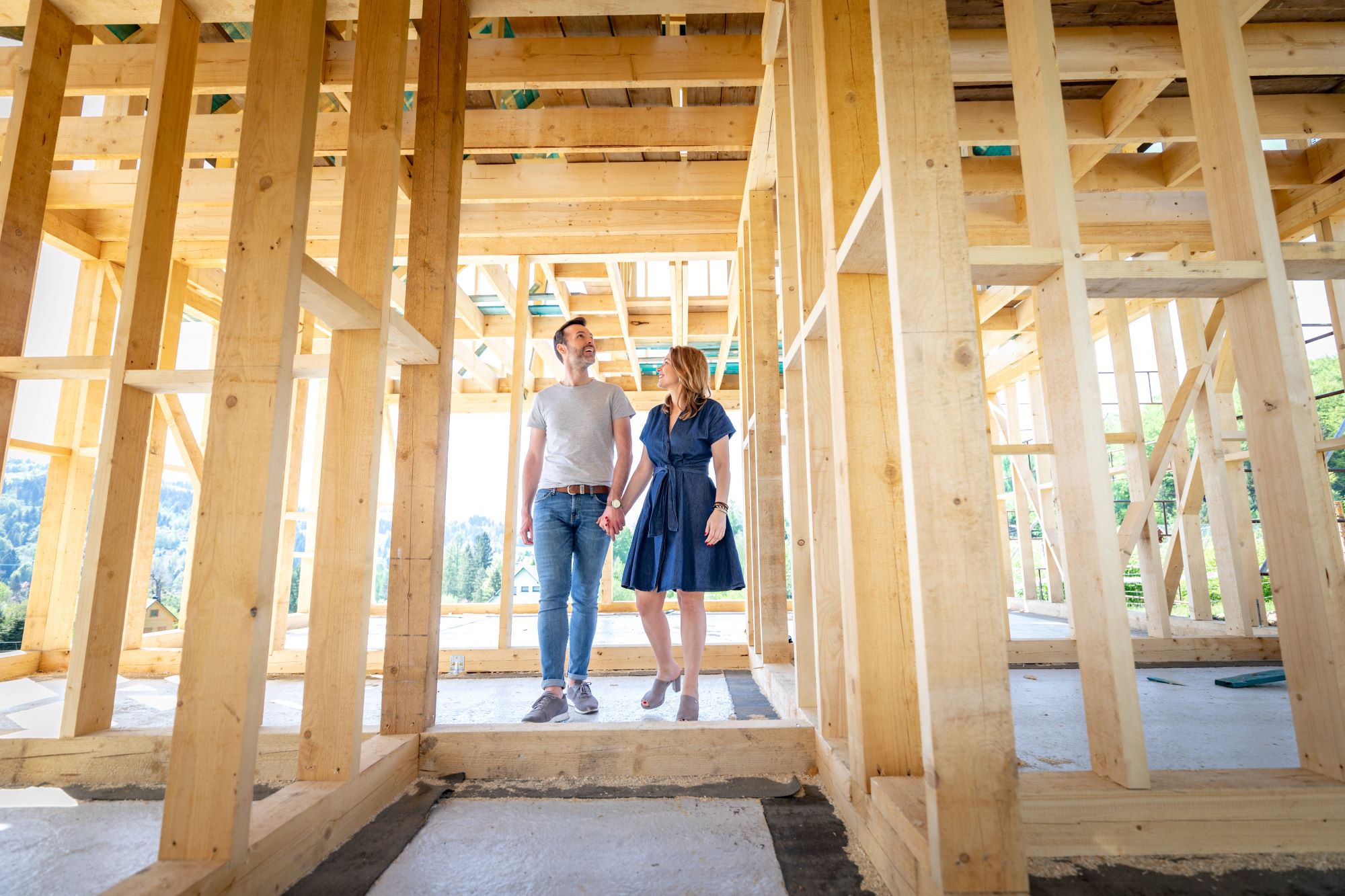 Couple at dream home construction site.