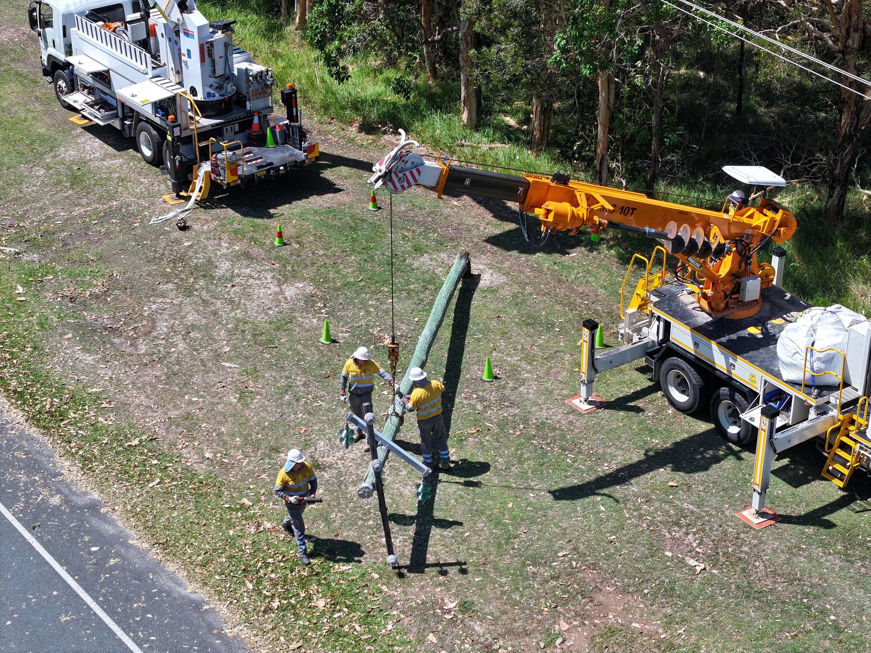 Energex crews fixing storm damage at Bribie Island