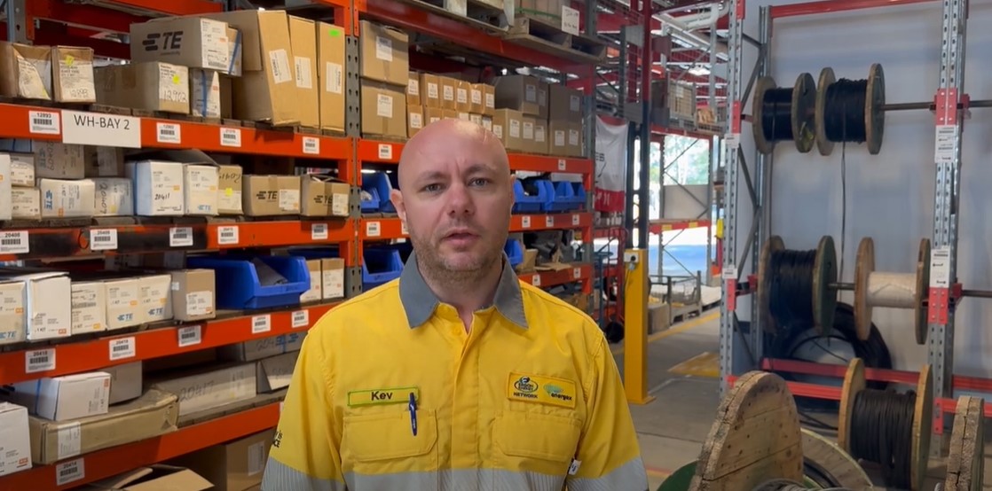Field crew member Kev Lavender standing in a depot